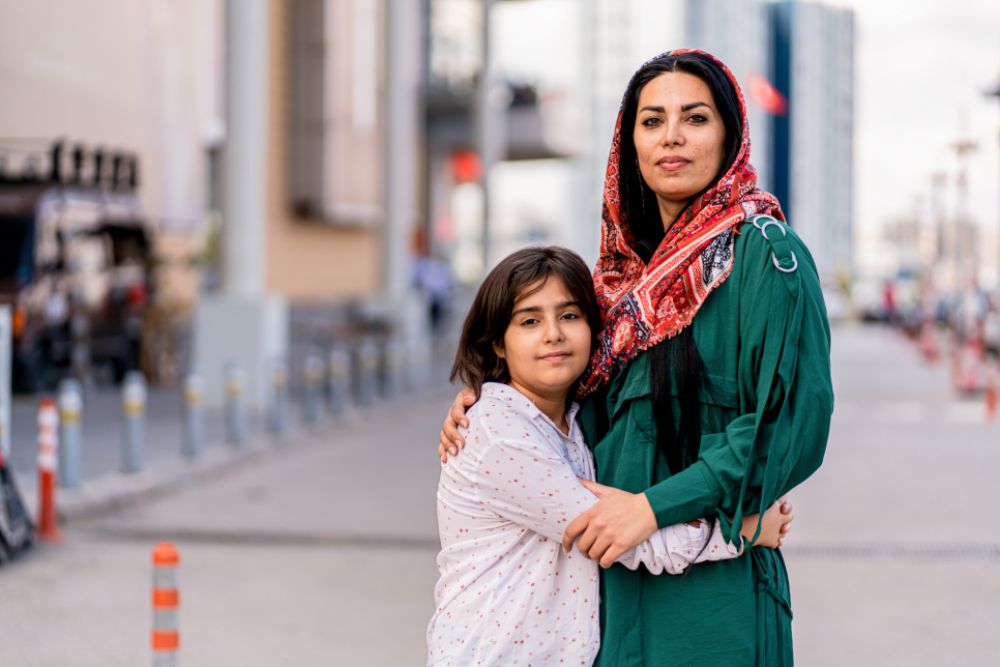 Migrantische Mutter und Kind