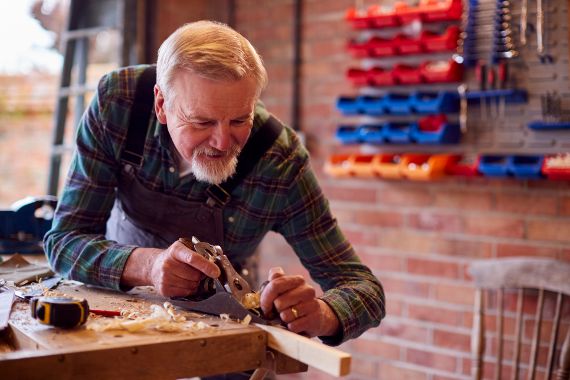 Man working with wood.